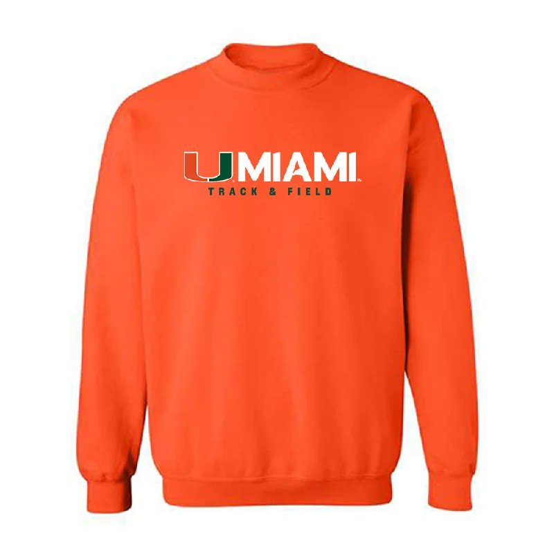 Miami - NCAA Women's Track & Field : Brittney Jennings - Classic Shersey Crewneck Sweatshirt Hoodie with Hem Detail Decorative Unique Miami - NCAA Women's Track & Field : Brittney Jennings - Classic Shersey Crewneck Sweatshirt Hoodie with Hem Detail Decorative Unique